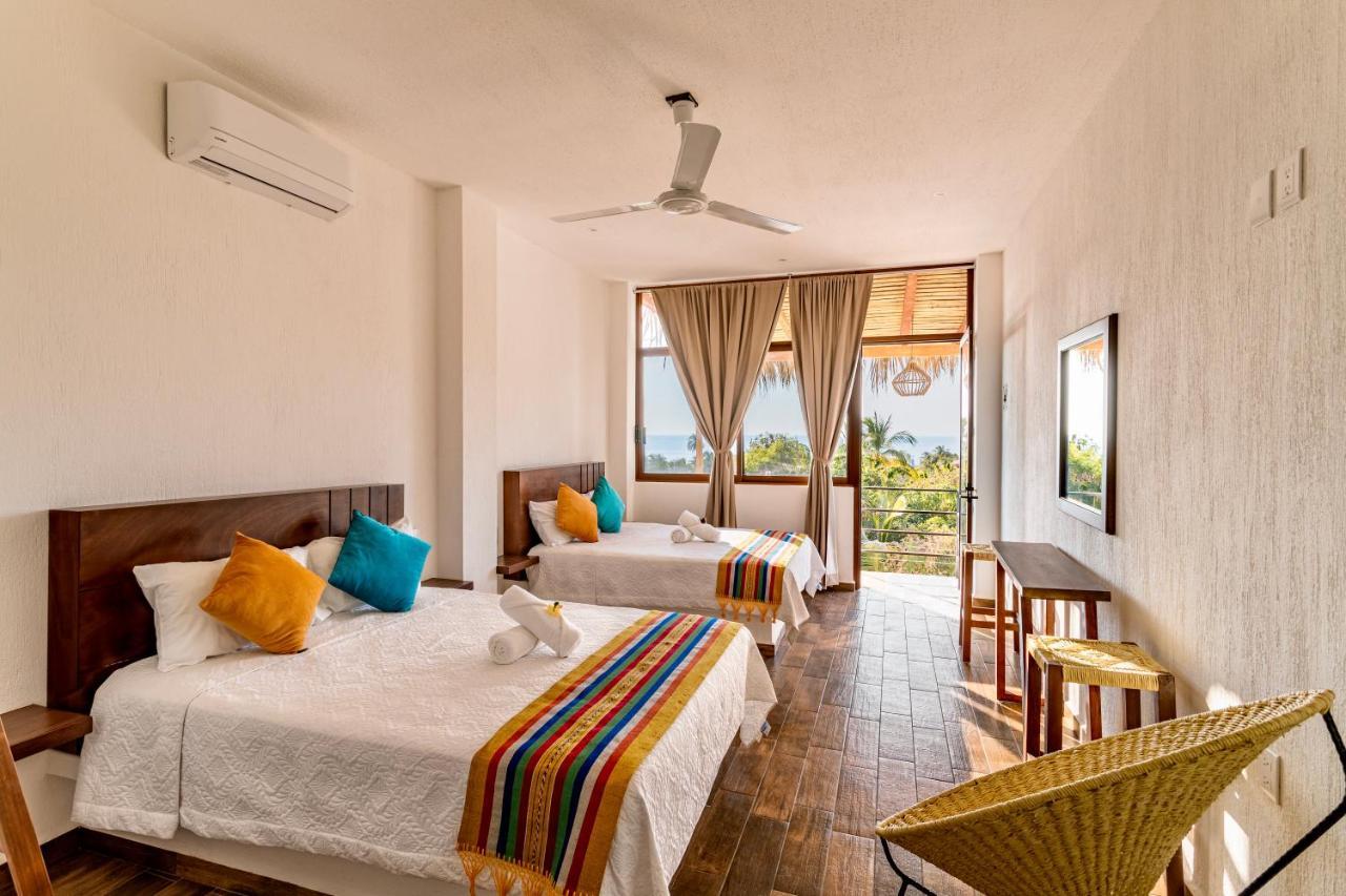 פוארטו אסקונדידו Punta Kai Hotel & Hostal מראה חיצוני תמונה