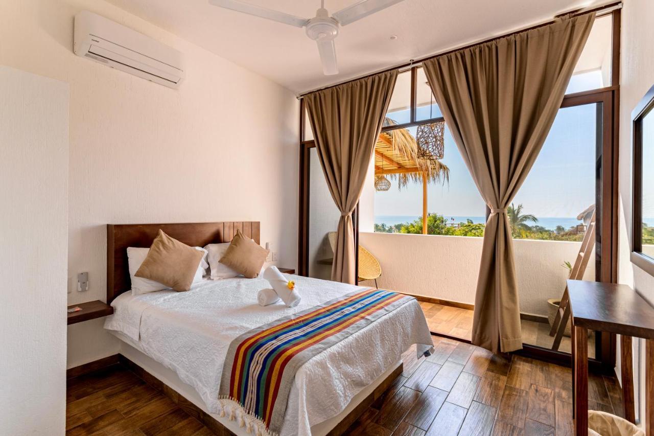 פוארטו אסקונדידו Punta Kai Hotel & Hostal מראה חיצוני תמונה